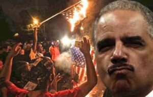 Ferguson-burning-flag-eric-holder