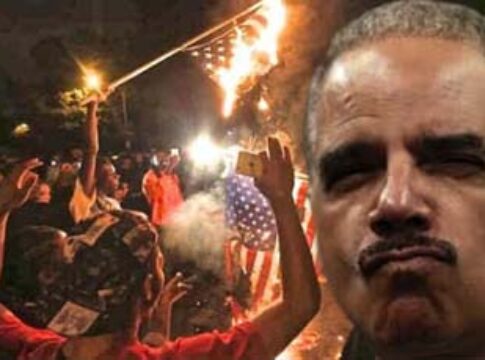 Ferguson-burning-flag-eric-holder