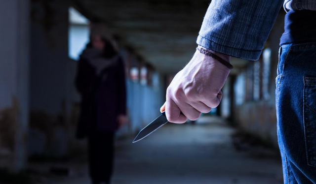 eu criminal-with-knife-waits-for-woman