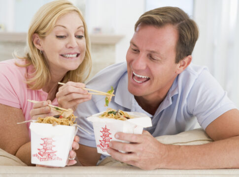 Couple Eating Takeaway CHINESE FOOD