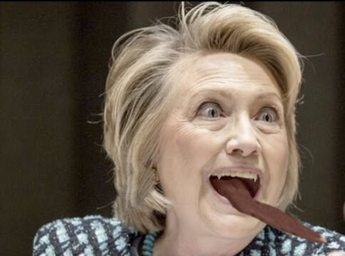 hillary clinton eats Pence fly