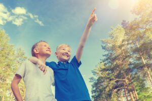 school pupils pointing at Teacher With Giant Rubber Boobs