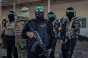 Hamas holds military parade to remember Israel's 2014 offensive. the hague paradox