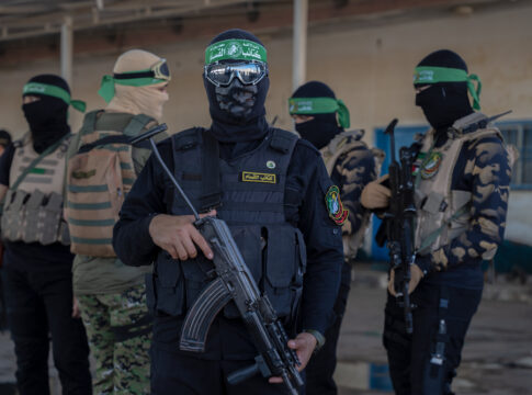 Hamas holds military parade to remember Israel's 2014 offensive. the hague paradox