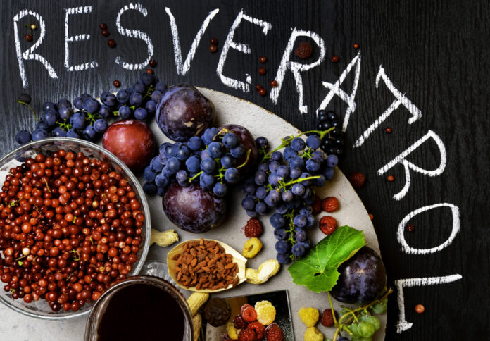 food rich with anti-ageing resveratrol, grapes, plums, goji, peanuts, cranberry,raspberrys, dark chocolate,red wine