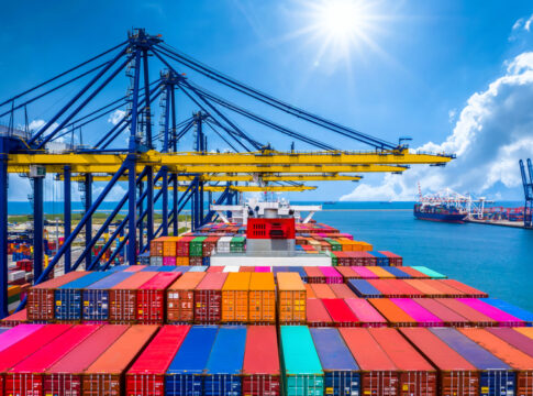 Container ship unloading in deep sea port, Global business logis china trade trump tariffs